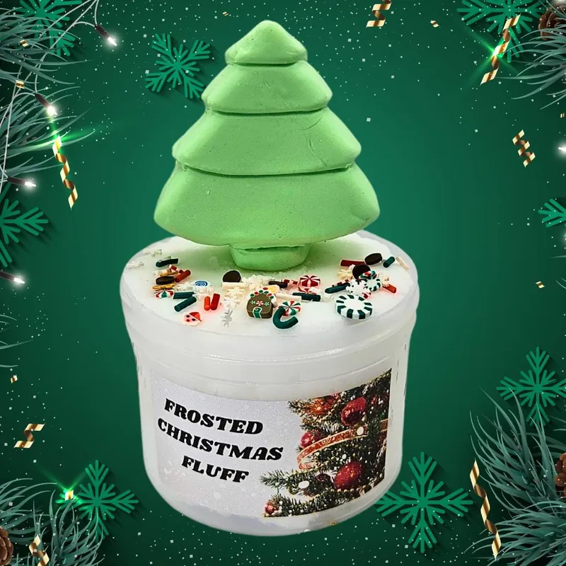 Frosted Christmas Fluff jar of white snow slime with a green Christmas tree clay topper