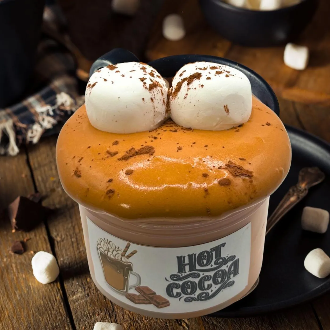 Hot Cocoa clay-kit slime with two white marshmallow clay toppers on brown slime