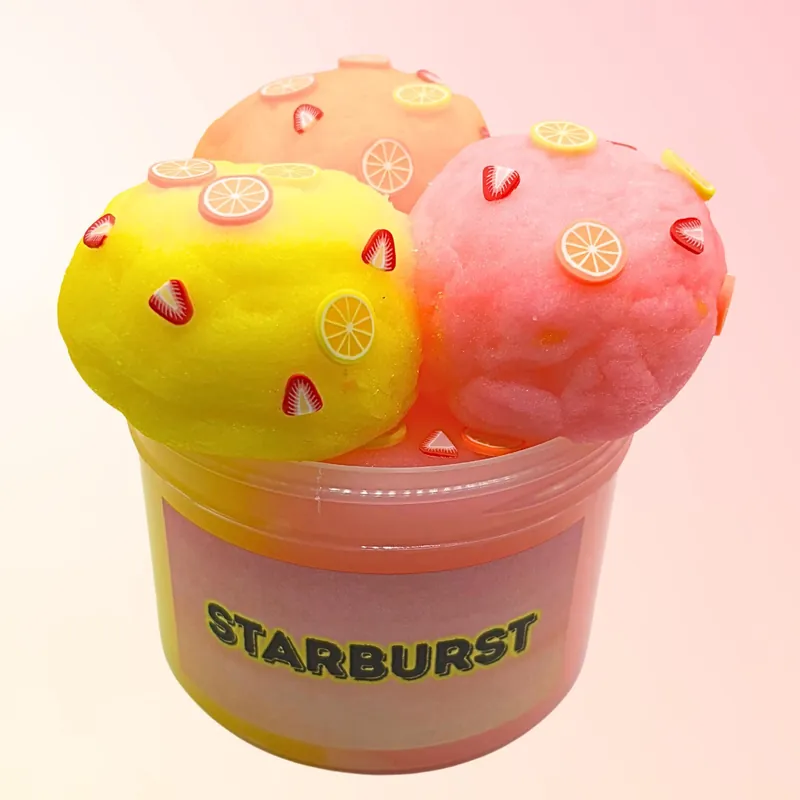 Starburst jar with yellow, orange and pink slime and three scoops on top